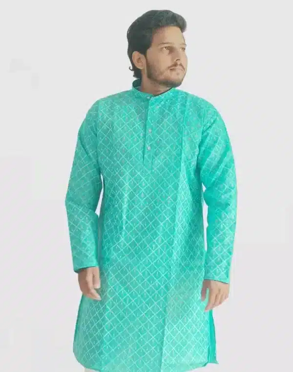A man wearing an aqua blue or turquoise full-sleeve kurta with an all-over gold geometric print, perfect for Diwali