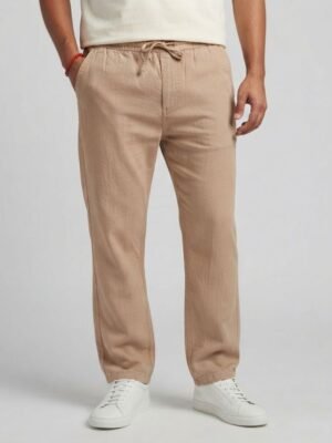 Loose fit comfortable sand beige summer trousers for men, breathable beach pants, relaxed-fit eco-friendly linen bottoms, casual warm-weather loungewear.